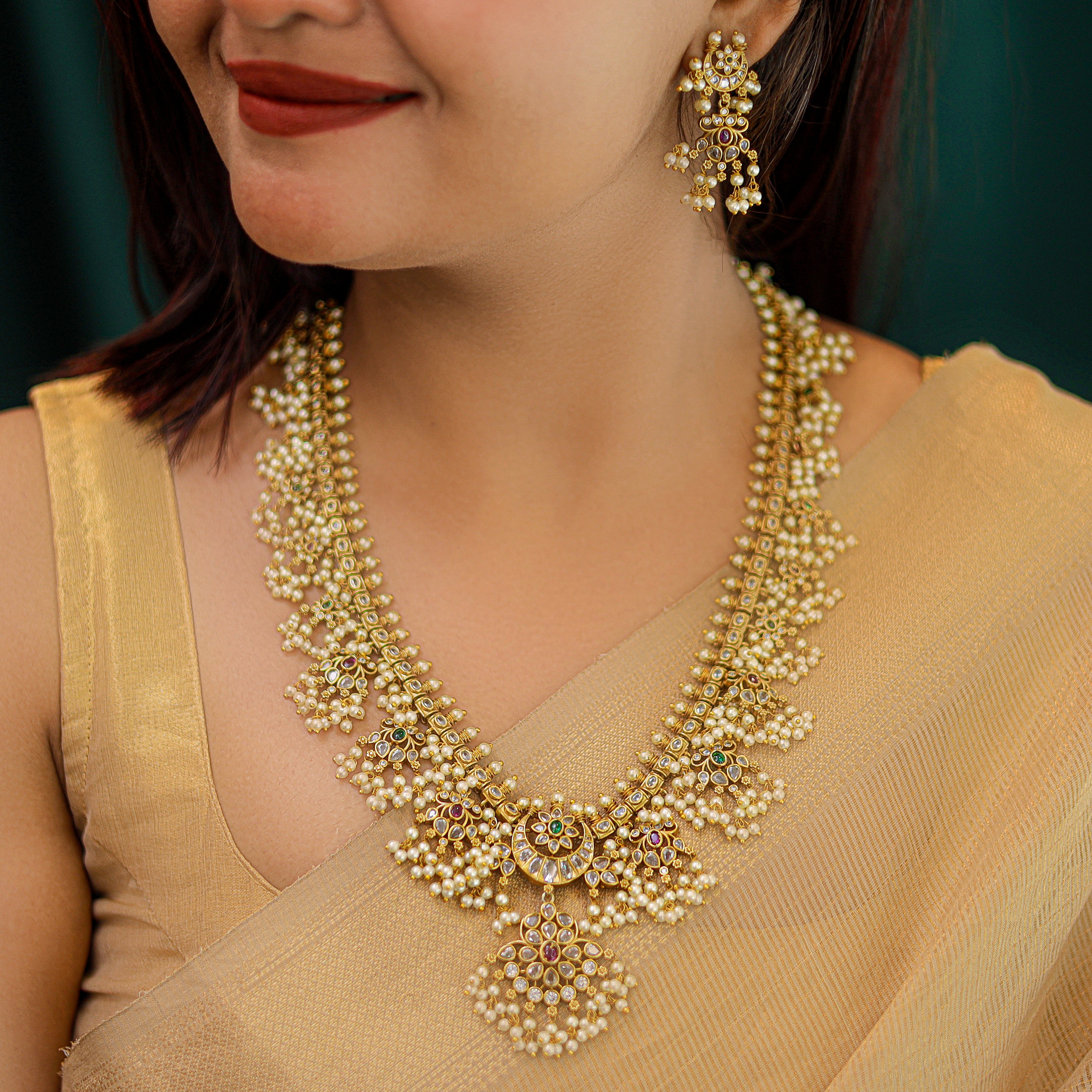 Ganishka Golden Crescent Pearl Long Neckpiece with Earring