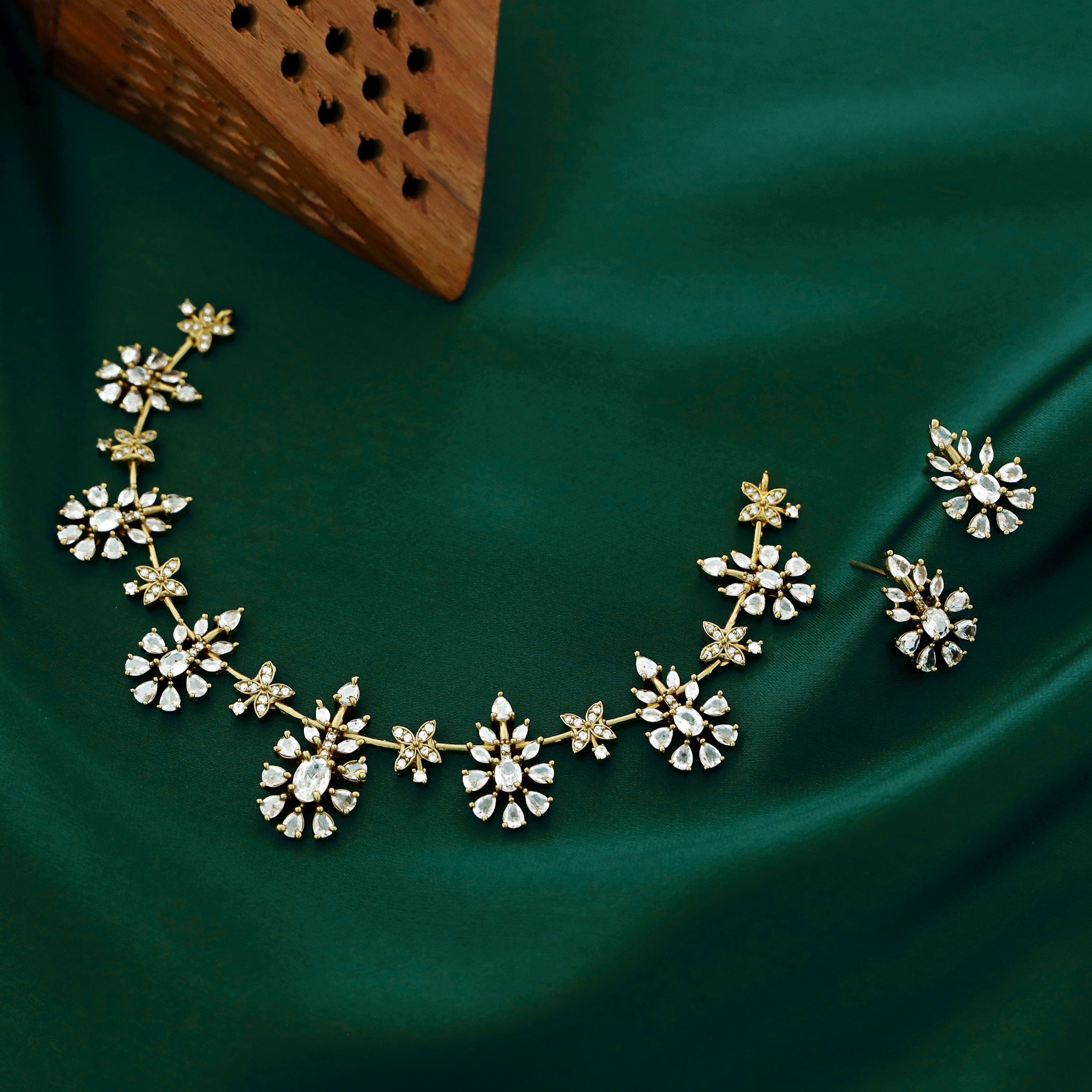 Akriti Gold Finish Motif Neckpiece With Earring