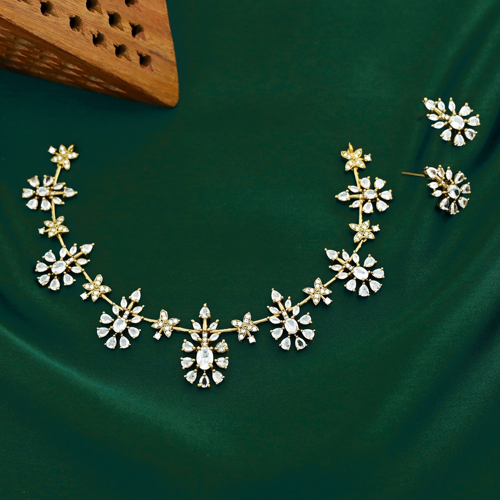 Akriti Gold Finish Motif Neckpiece With Earring