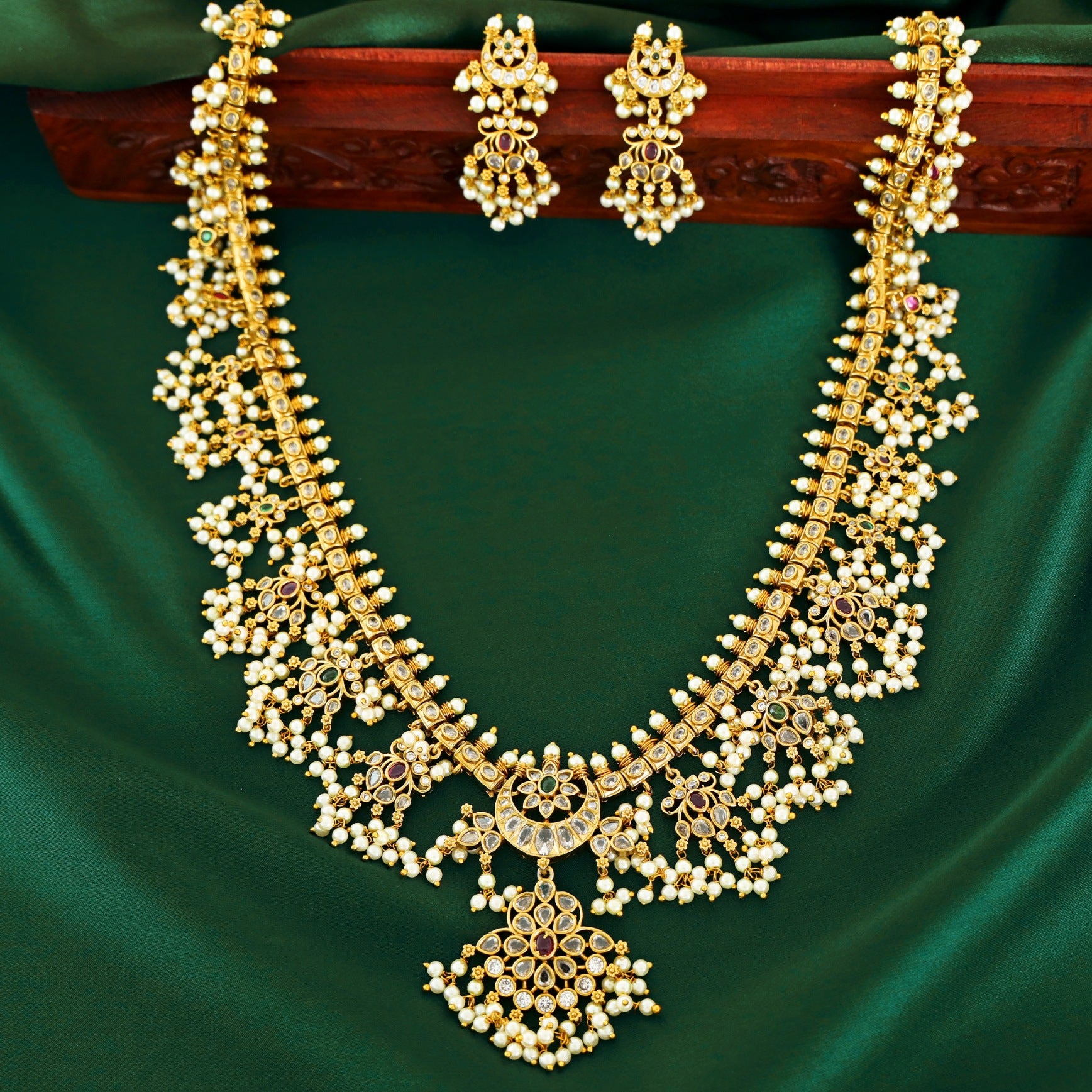 Ganishka Golden Crescent Pearl Long Neckpiece with Earring