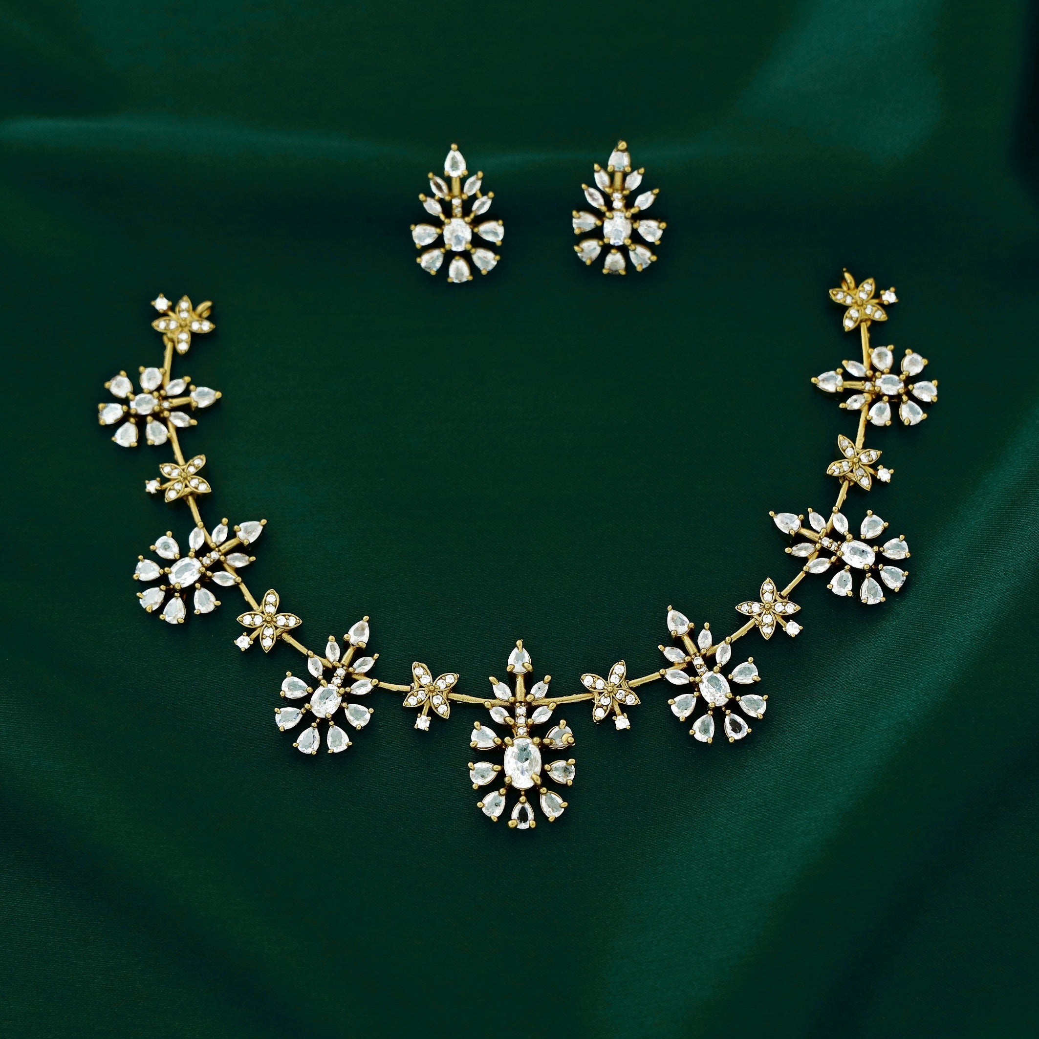 Akriti Gold Finish Motif Neckpiece With Earring