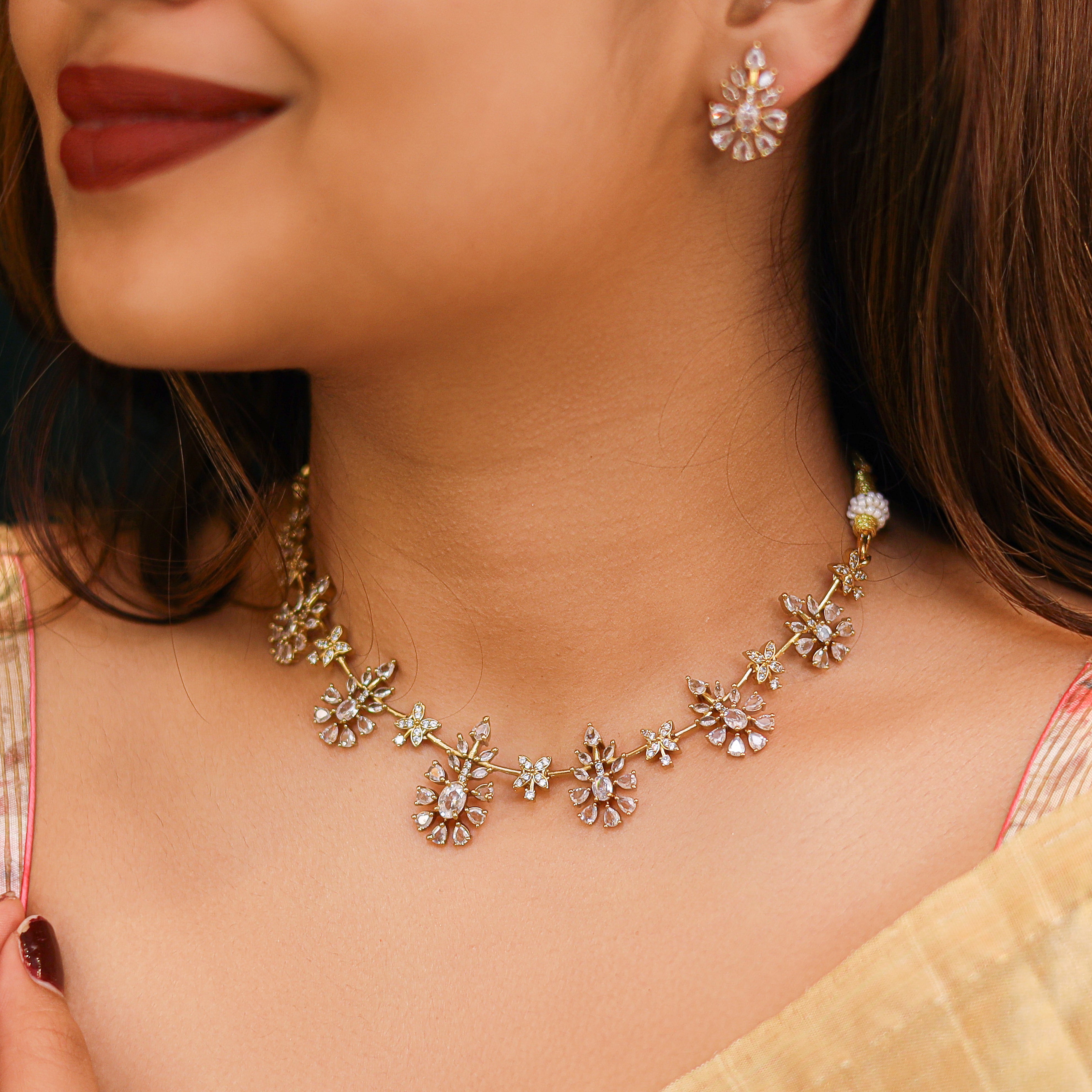 Akriti Gold Finish Motif Neckpiece With Earring